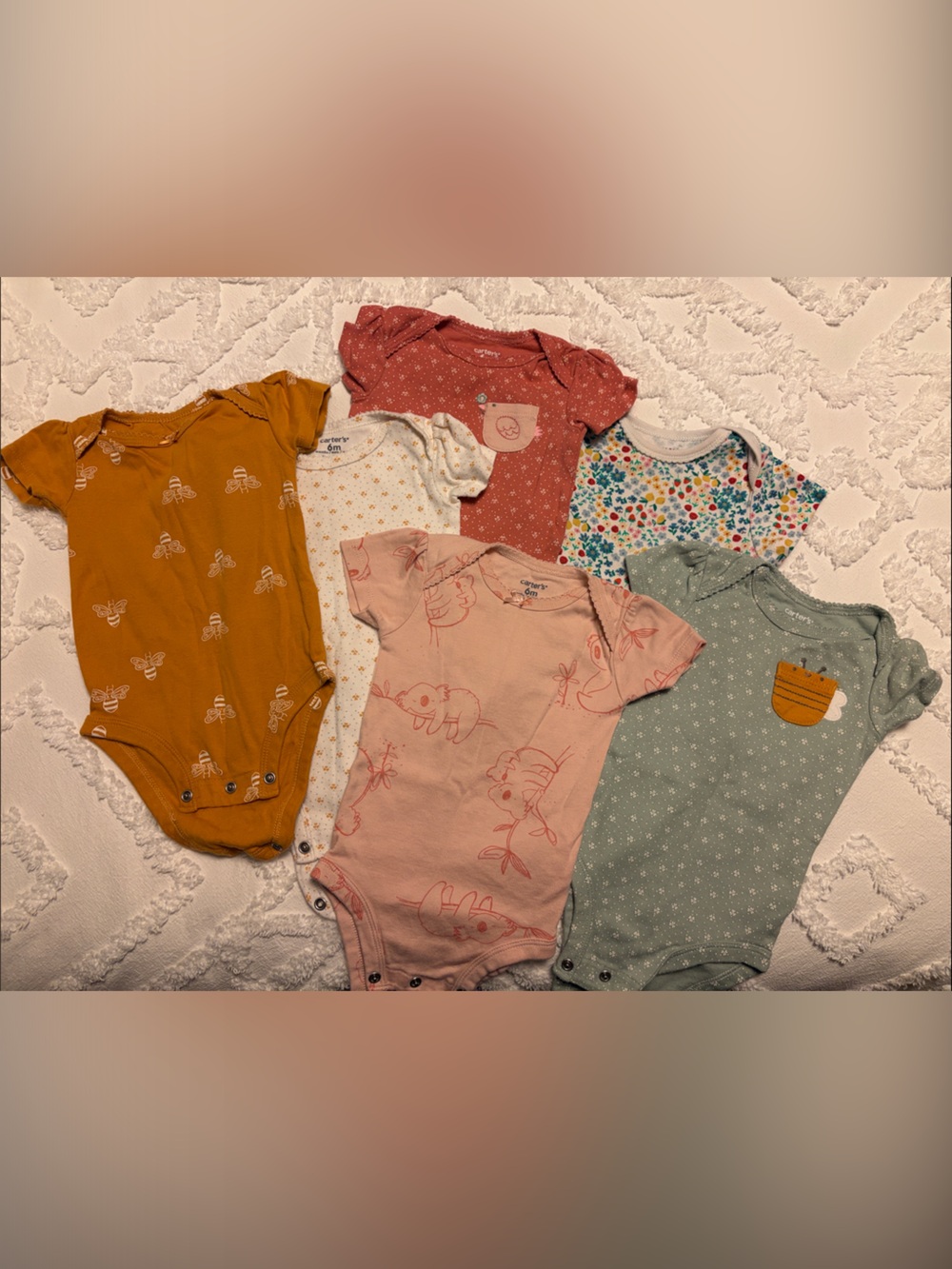 Mixed Baby Girls Onesie Bundle - Mustard, Pink, Green, Floral. Six pieces.
